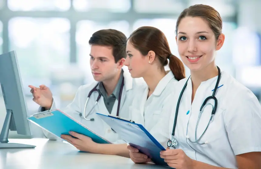 Group of medical students studying in classroom